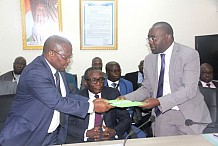 Cérémonie de passation de charges au poste de directeur général du BNETD entre monsieur Pascal Kra Kofi et Kinapara COULIBALY